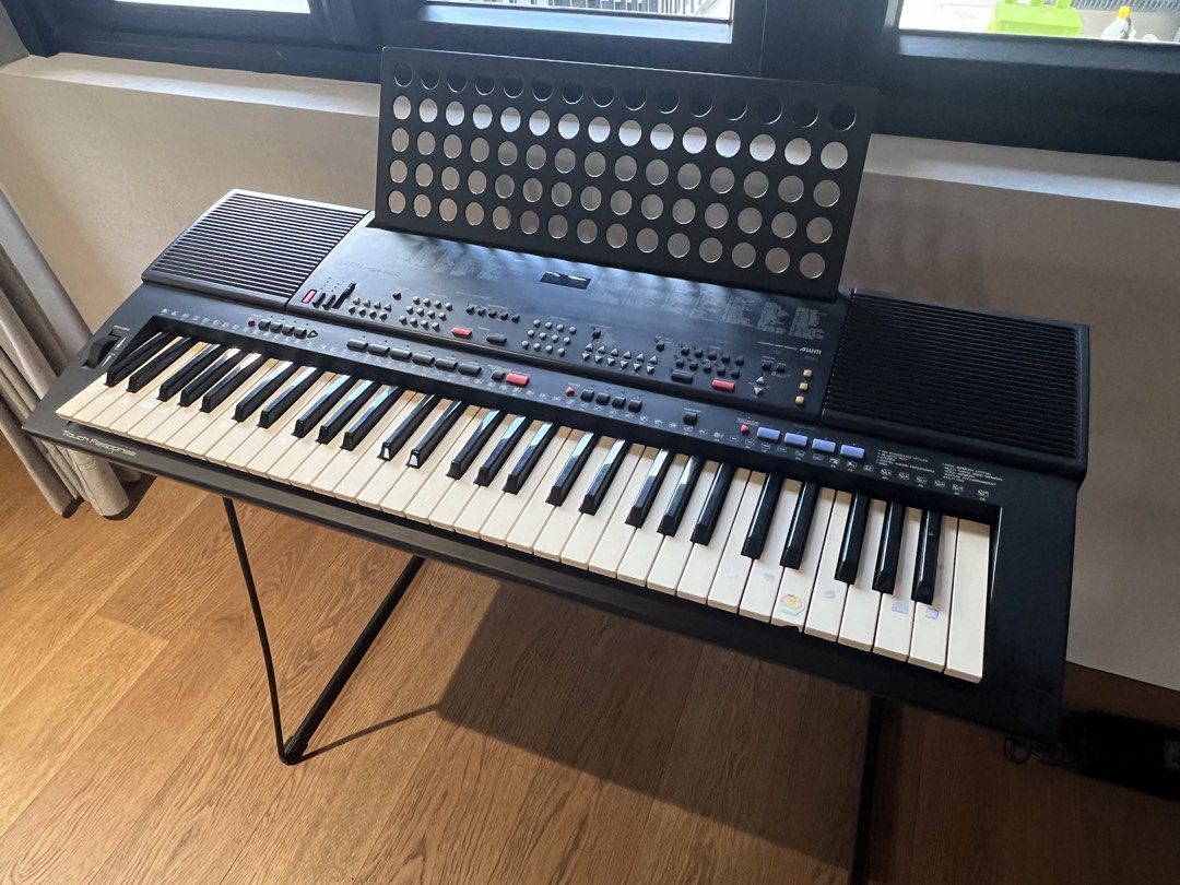 Yamaha PSR-500 Electronic Keyboard with Stand (Category: Musical Instruments) located in Pasig City. Submitted by cheryl.tan.1 (Listing ID 1449588213, Image 1). Description: - Yamaha PSR-500 keyboard - Touch response feature - Includes music stand - Comes with a metal stand - Ideal for learning and playing - All keys and buttons intact - Ready for its new home.