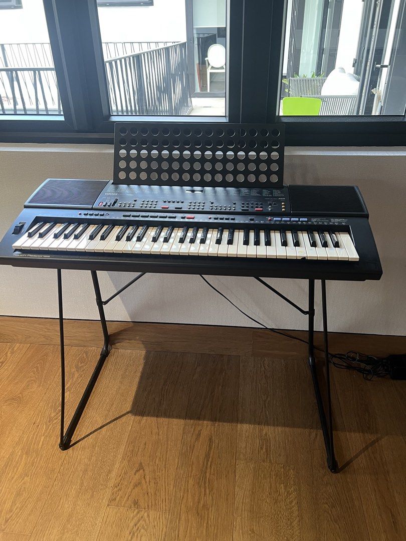 Yamaha PSR-500 Electronic Keyboard with Stand (Category: Musical Instruments) located in Pasig City. Submitted by cheryl.tan.1 (Listing ID 1449588213, Image 2). Description: - Yamaha PSR-500 keyboard - Touch response feature - Includes music stand - Comes with a metal stand - Ideal for learning and playing - All keys and buttons intact - Ready for its new home.