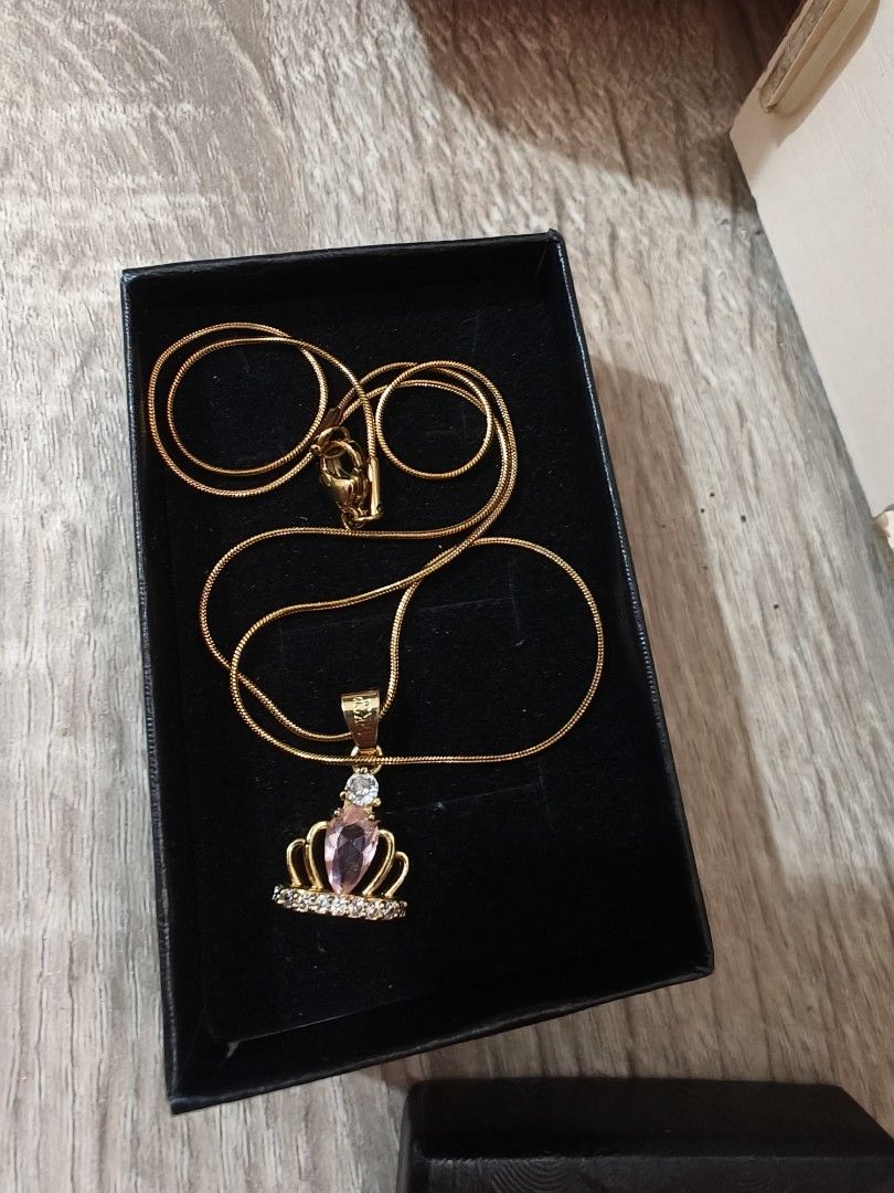 18kgp (goldplated) Crown Necklace (Category: Necklaces) located in Binangonan. Submitted by prettyqueen08 (Listing ID 1449925319, Image 2). Description: - 18k Gold Plated Crown Necklace - 18 inches chain - Non tarnish - Comes with a box.