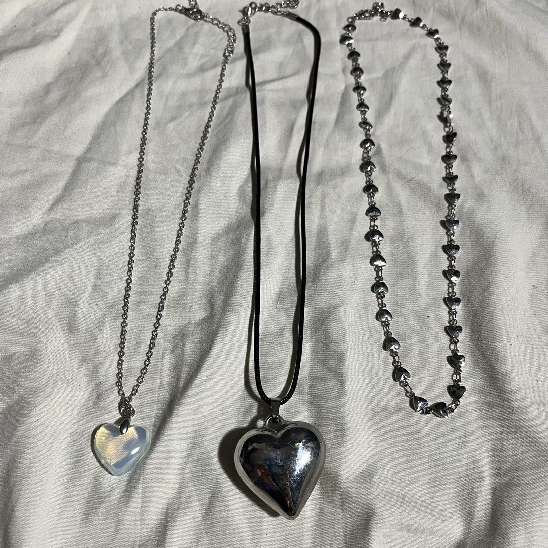 3 pcs heart necklaces silver pendant design (Category: Necklaces) located in Manila. Submitted by whiteforesttea178 (Listing ID 1449874452, Image 2). Description: never used non tarnish take all 3 pcs na 🔵 NO when worn, NO other pics 🔵 What you see is what you get. RFS: Decluttering. 🔵 NO return, NO refund ----------------------------------------------------------------------------------------- ‼️ BEFORE INQUIRING — PLEASE READ ‼️ 🚫 If nakapo