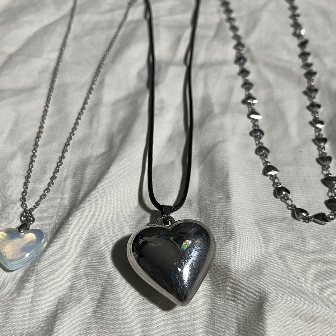 3 pcs heart necklaces silver pendant design (Category: Necklaces) located in Manila. Submitted by whiteforesttea178 (Listing ID 1449874452, Image 3). Description: never used non tarnish take all 3 pcs na 🔵 NO when worn, NO other pics 🔵 What you see is what you get. RFS: Decluttering. 🔵 NO return, NO refund ----------------------------------------------------------------------------------------- ‼️ BEFORE INQUIRING — PLEASE READ ‼️ 🚫 If nakapo
