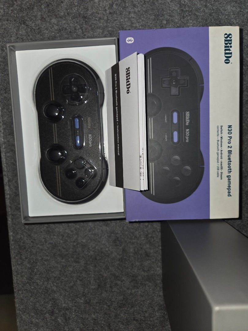 8BitDo N30 Pro 2 Bluetooth Gamepad (Category: Controllers) located in Quezon City. Submitted by gutterflower (Listing ID 1449755860, Image 2). Description: 8BitDo N30 Pro 2 Bluetooth Gamepad - In very good condition, like brand new - original bought from datablitz - Compatible with: Nintendo Switch, Windows, Android, macOS - Complete with box and accessories Last price already, thanks..