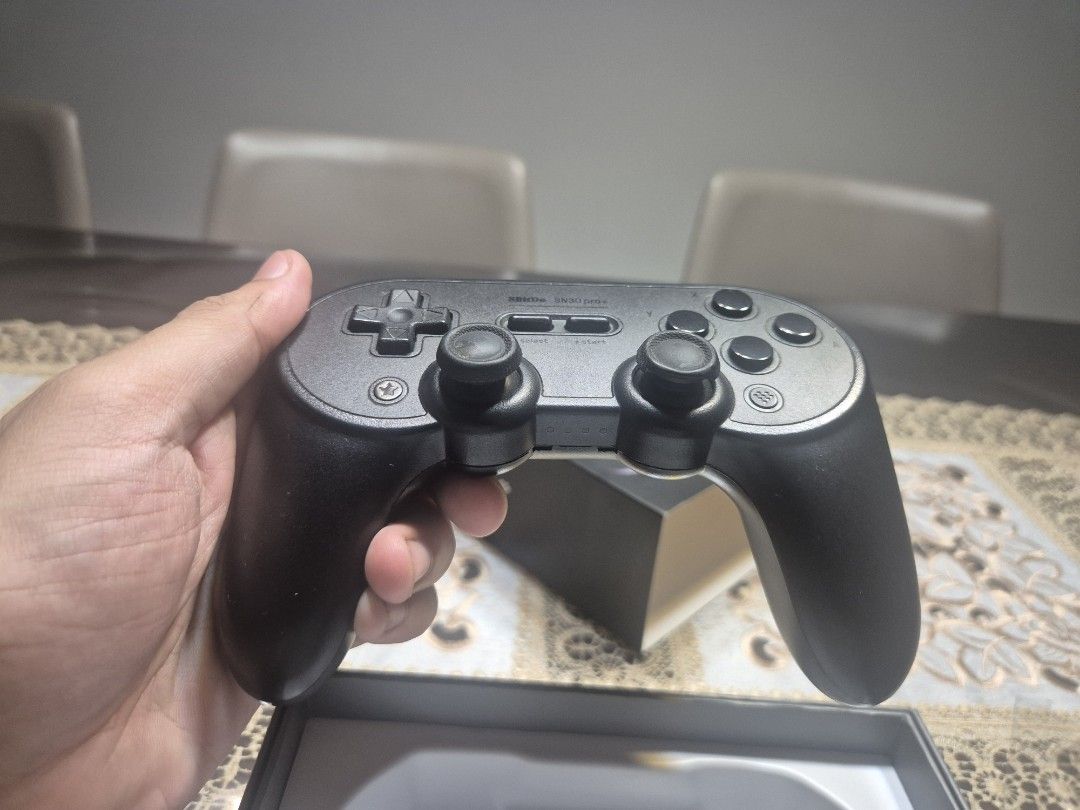 8BitDo SN30 Pro+ Bluetooth controller (Category: Controllers) located in Singapore. Submitted by haha_beans_87 (Listing ID 1449929470, Image 3). Description: [read plz thanks] Note: no charging cable letting it go as I have upgraded to a better controller and the joysticks are not original. Still useable or alternatively can be used as donor parts for repairs of the same controller. contents: - 8Bitdo Sn30 Pro+ controller - Rechargable battery (i