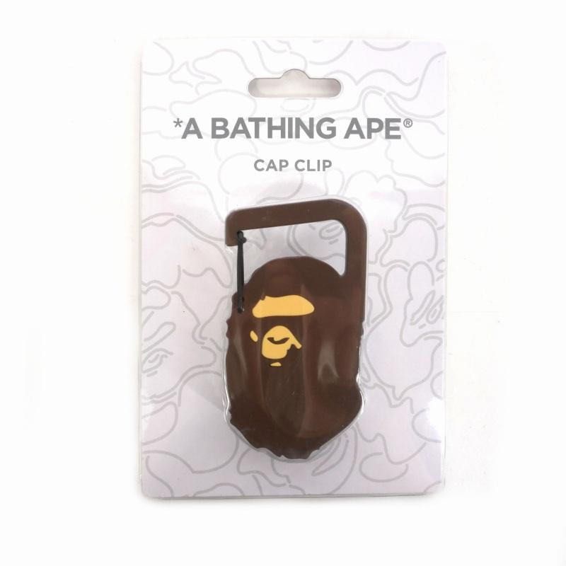 A Bathing Ape (BAPE) cap clip (Category: Luxury Accessories) located in Pasay City. Submitted by slideph (Listing ID 1449754459, Image 3). Description: - Authentic A Bathing Ape (BAPE) Cap Clip - Imported directly from Japan - Features the iconic BAPE Ape Head logo - Durable carabiner-style clip for easy attachment - Perfect for securing caps to bags, belts, or luggage - Comes sealed on original BAPE branded packaging FREE SHIP!.