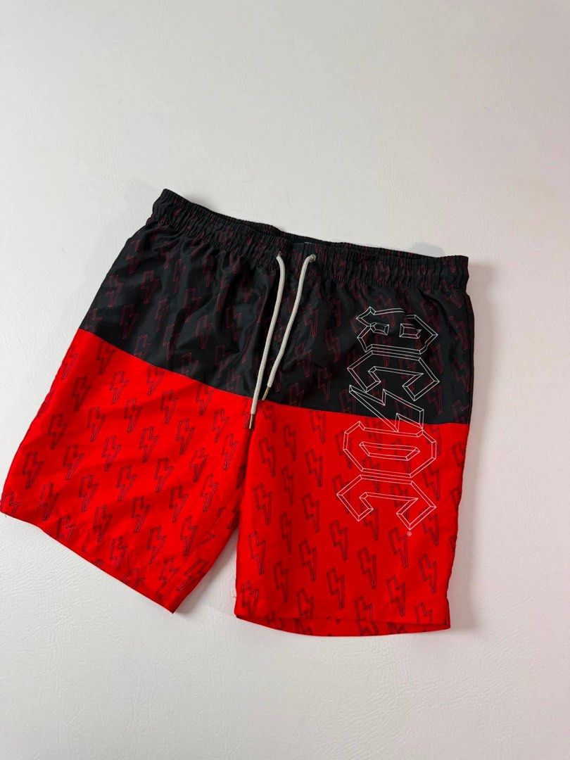 AC/DC BOARD SHORTS (Category: Shorts) located in Guagua. Submitted by sweetboyy (Listing ID 1449778256, Image 2). Description: AC/DC BOARD SHORTS EXCELLENCE CONDITION / NO ISSUE SIZE LARGE ON TAG / DIMES W36-38 L19.