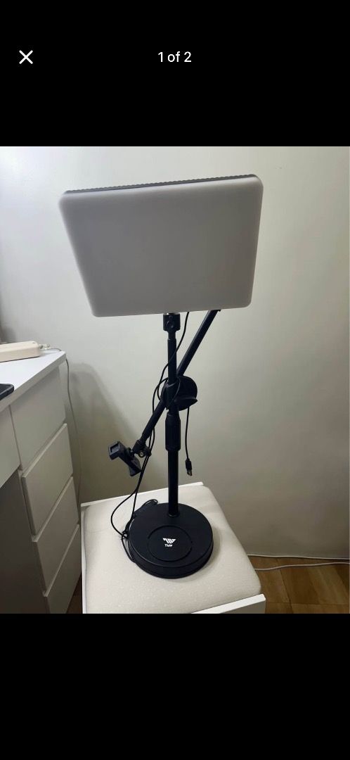Adjustable LED Ring Light with Stand and Phone Holder (Category: Lighting & Studio Equipment) located in Caloocan City. Submitted by srdmarjori21523 (Listing ID 1449888188, Image 2). Description: - Versatile LED ring light for various uses - Adjustable stand and secure phone holder included - Bright, easily positionable light - Ideal for content creation, video calls, and photography - USB powered for convenience - Stable and reliable base.