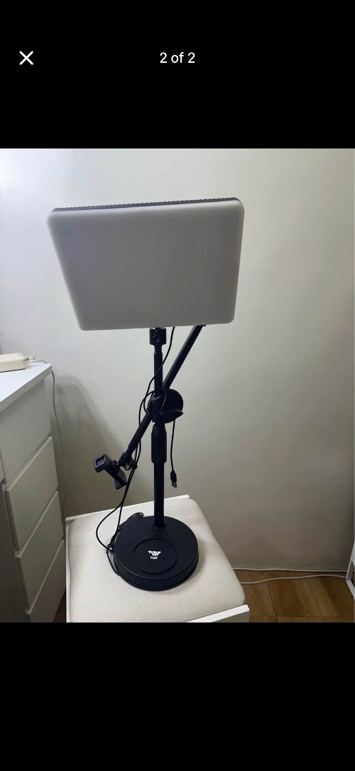 Adjustable LED Ring Light with Stand and Phone Holder (Category: Lighting & Studio Equipment) located in Caloocan City. Submitted by srdmarjori21523 (Listing ID 1449888188, Image 1). Description: - Versatile LED ring light for various uses - Adjustable stand and secure phone holder included - Bright, easily positionable light - Ideal for content creation, video calls, and photography - USB powered for convenience - Stable and reliable base.
