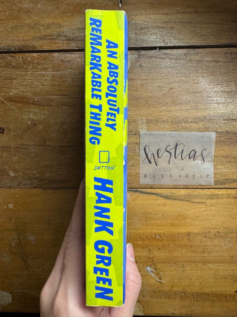 An Absolutely Remarkable Thing by Hank Green (Category: Storybooks) located in Malaybalay. Submitted by hestias_bookshelf (Listing ID 1449855139, Image 3). Description: tanning and foxing.