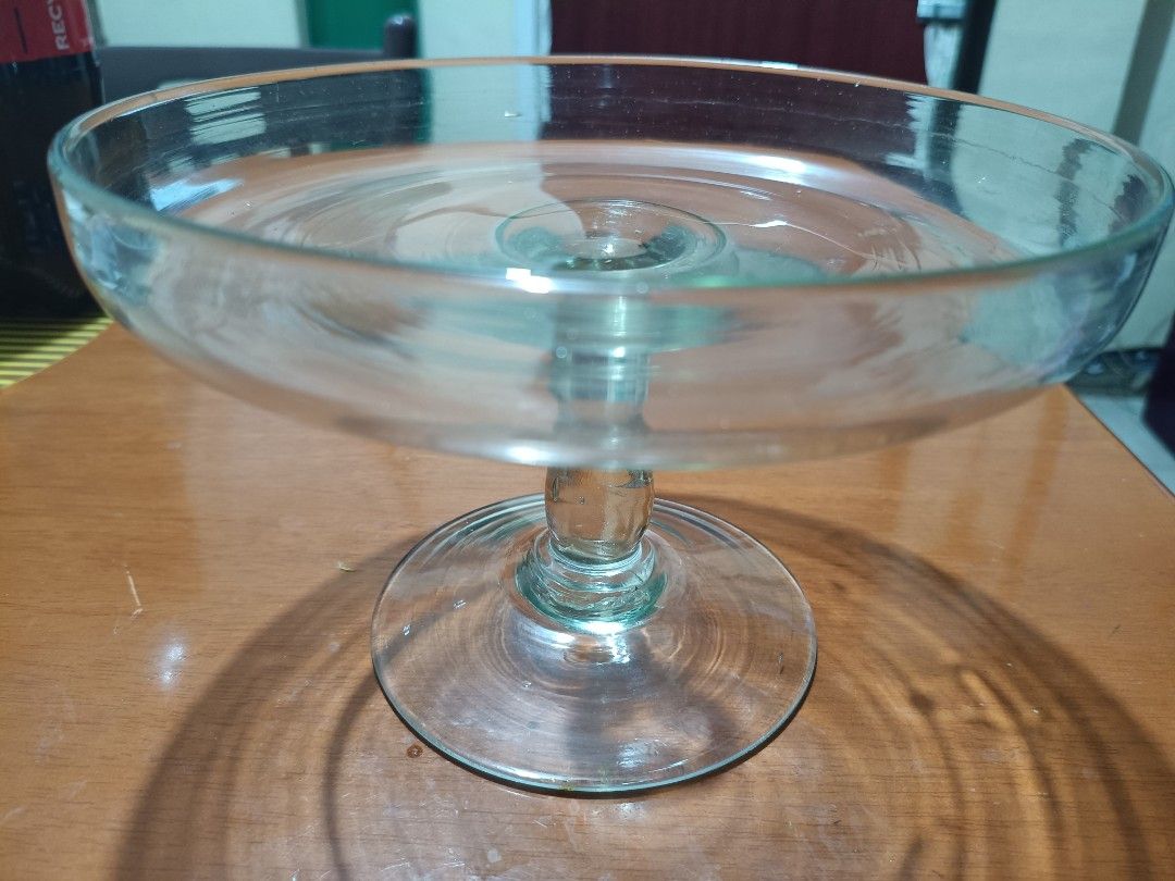 Antique Pedestal Cake/ Fruit Stand (Category: Other Kitchenware & Tableware) located in Paranaque City. Submitted by chachamyeon0715 (Listing ID 1449856181, Image 1). Description: - Antique cake/ fruit stand (not sure if this is from the Princess House Heritage collection) - Beautiful clear glass cake stand - Sturdy pedestal base for stability - Ideal for displaying cakes, desserts, and fruits or as decorative centerpiece - Dimensions: Approx. 9.