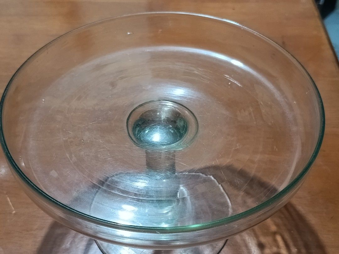 Antique Pedestal Cake/ Fruit Stand (Category: Other Kitchenware & Tableware) located in Paranaque City. Submitted by chachamyeon0715 (Listing ID 1449856181, Image 3). Description: - Antique cake/ fruit stand (not sure if this is from the Princess House Heritage collection) - Beautiful clear glass cake stand - Sturdy pedestal base for stability - Ideal for displaying cakes, desserts, and fruits or as decorative centerpiece - Dimensions: Approx. 9.