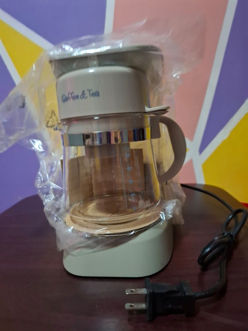 ***Asahi Coffee Maker CM-026*** (Category: Coffee Machines & Makers) located in Taguig. Submitted by matuts1216 (Listing ID 1449897892, Image 3). Description: Practical & easy to use. It can brew up to 5 cups & has the useful "keep warm" function, it's simple to use & easy to clean. The clear view of the brewing process through the glass carafe adds a "coffee shop vibe" to home use. -Drip Coffee Maker -5-cup capacity -650W -Glass carafe -Re-usabl