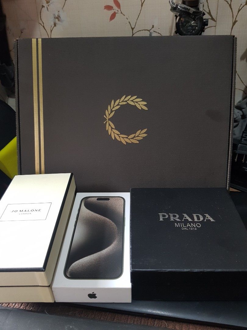 Assorted Empty Boxes (Category: Other Mobile & Gadget Accessories) located in Quezon City. Submitted by chadrison (Listing ID 1449918432, Image 2). Description: - Apple iPhone 13 Pro - Jo Malone London perfume box - Prada Milano box - Large Fred Perry box.