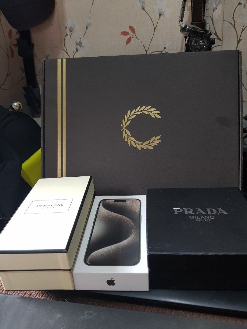 Assorted Empty Boxes (Category: Other Mobile & Gadget Accessories) located in Quezon City. Submitted by chadrison (Listing ID 1449918432, Image 1). Description: - Apple iPhone 13 Pro - Jo Malone London perfume box - Prada Milano box - Large Fred Perry box.