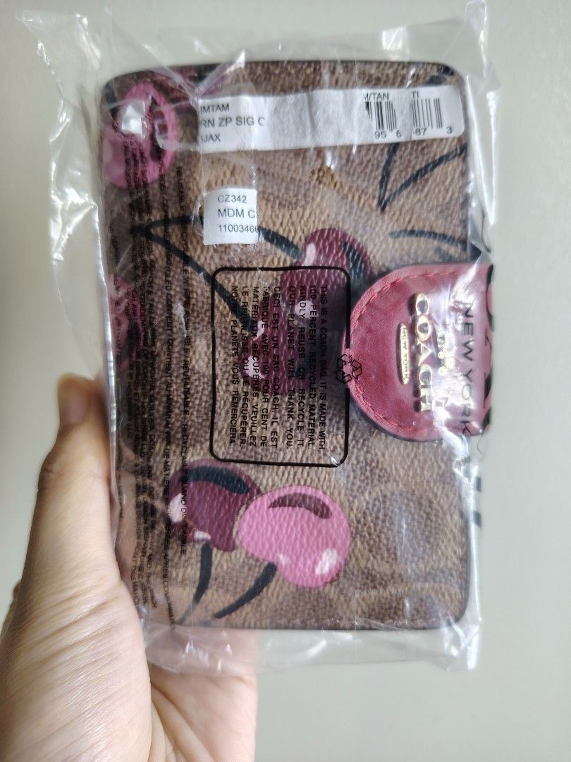 Authentic Coach Cherry Print Wallet (Category: Luxury Bags & Wallets) located in Quezon City. Submitted by chantillycee (Listing ID 1449800058, Image 2). Description: - Made in Vietnam - Authentic - with tags.