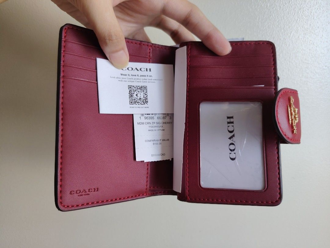 Authentic Coach Cherry Print Wallet (Category: Luxury Bags & Wallets) located in Quezon City. Submitted by chantillycee (Listing ID 1449800058, Image 3). Description: - Made in Vietnam - Authentic - with tags.