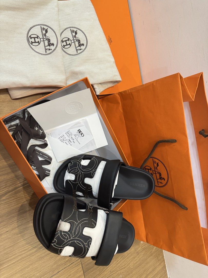 Authentic Hermes Chypre 36.5 (Category: Flats & Sandals) located in Quezon City. Submitted by cnalejandro (Listing ID 1449824627, Image 1). Description: - Authentic Hermes Chypre Sandals - Color: Black leather - Condition: brand new - Includes: comes super complete. Original box, dust bags, and receipt Best fits tts 36 Original price is 73k Rfs: wrong size.