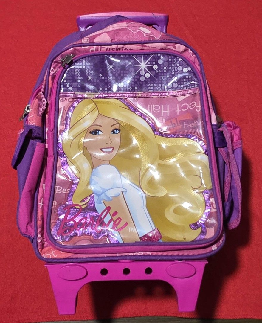 Barbie 16-inch Rolling Trolley School Bag (Category: Laptop Bags & Sleeves) located in Malolos. Submitted by candyproj (Listing ID 1449813685, Image 1). Description: Barbie 16-inch Rolling Trolley School Bag Good condition what you see is what you get RFS: Decluterring/Magrating Price is Negotiable.