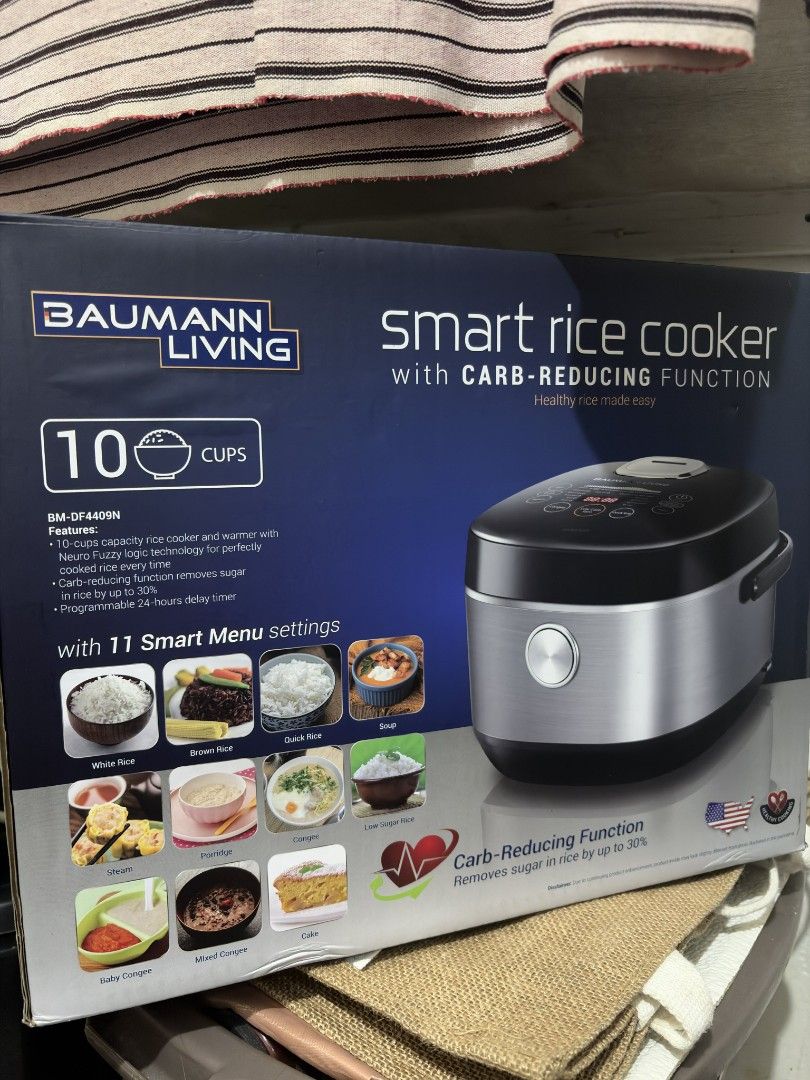 Baumann Living Smart Rice Cooker with Carb-Reducing Function (Category: Cookers) located in Las Pinas. Submitted by anythinganywearols (Listing ID 1449750470, Image 1). Description: - Baumann Living Smart Rice Cooker - 10 cups capacity - Carb-reducing function (removes up to 30% sugar) - 11 smart menu settings (White Rice, Brown Rice, Soup, Cake, etc.) - Programmable 24-hour delay timer - Easy touch control panel with LED display - Detachable inn