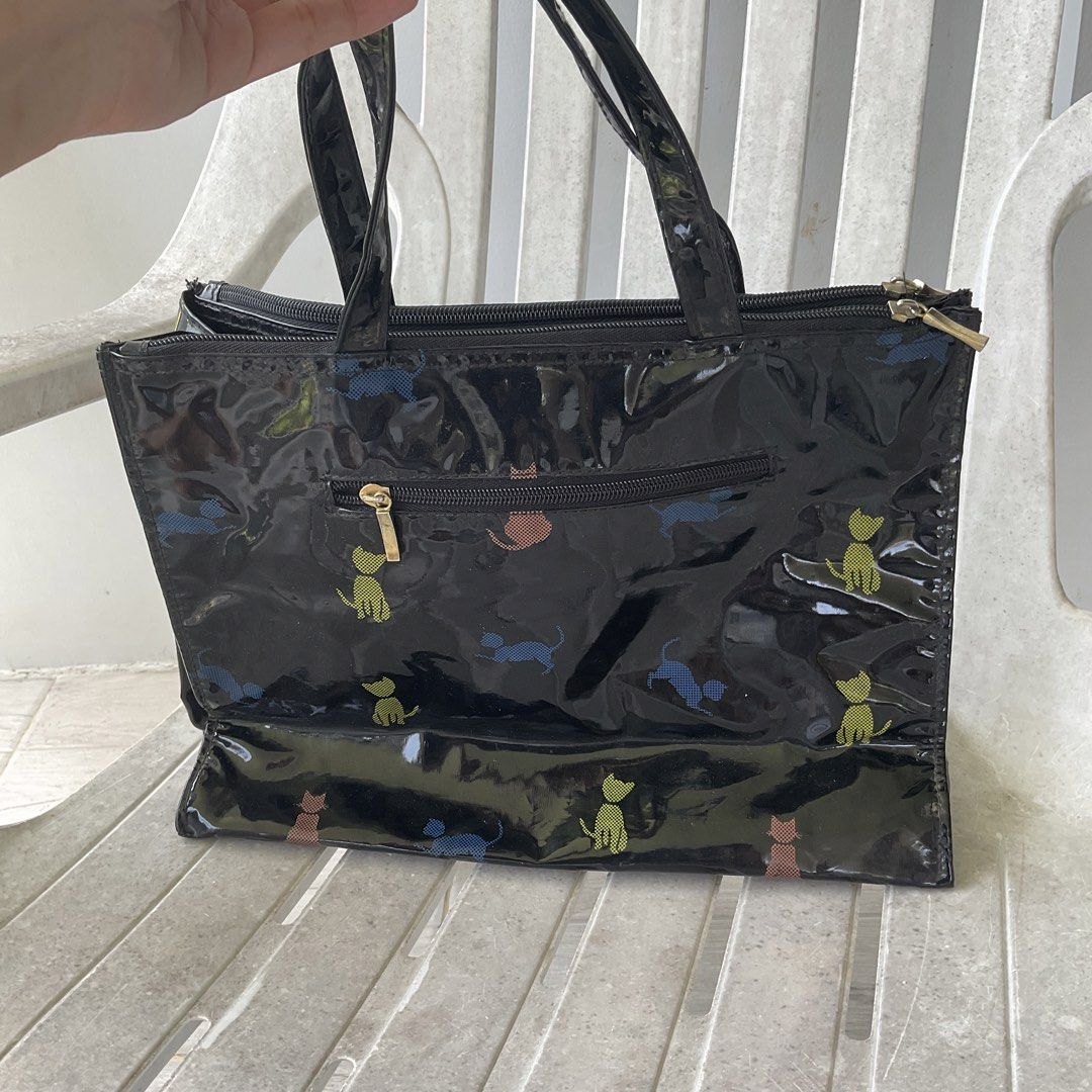 Black Cat Silhouette Pattern Plain Wind Tote Glossy Handbag Cat lover (Category: Tote Bags) located in Calumpit. Submitted by theannes (Listing ID 1449881680, Image 3). Description: Black Cat Pattern Plain Wind Tote Handbag Check photos for wear and tear Check photos for measurements Mode of Payment: Gcash No return and no exchange Questions? Send a message .