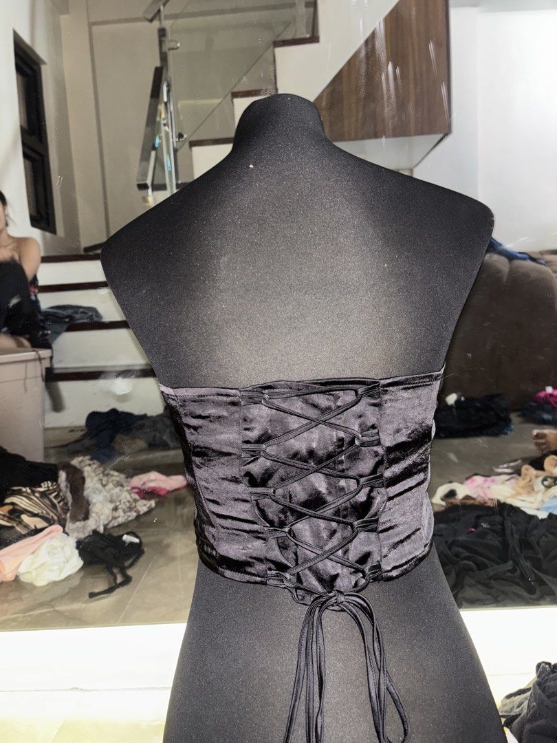 Black Corset Top with Lace-Up Back (Category: Others Tops) located in Caloocan City. Submitted by chariehalili18-05051 (Listing ID 1449932122, Image 2). Description: - Strapless black corset top - Structured bodice for a flattering fit - Lace-up back for adjustable sizing - Fabric with a subtle sheen - Versatile for dressing up or down.