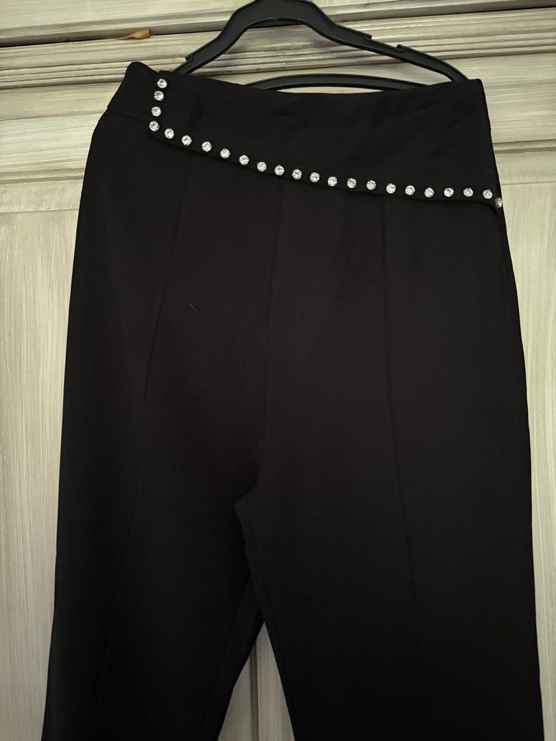 Black Flared Pants with Rhinestone Waistband (Category: Other Bottoms) located in Manila. Submitted by made_byxx (Listing ID 1449836723, Image 2). Description: High waist Fits small - medium frame 28inches Length - 40inches.