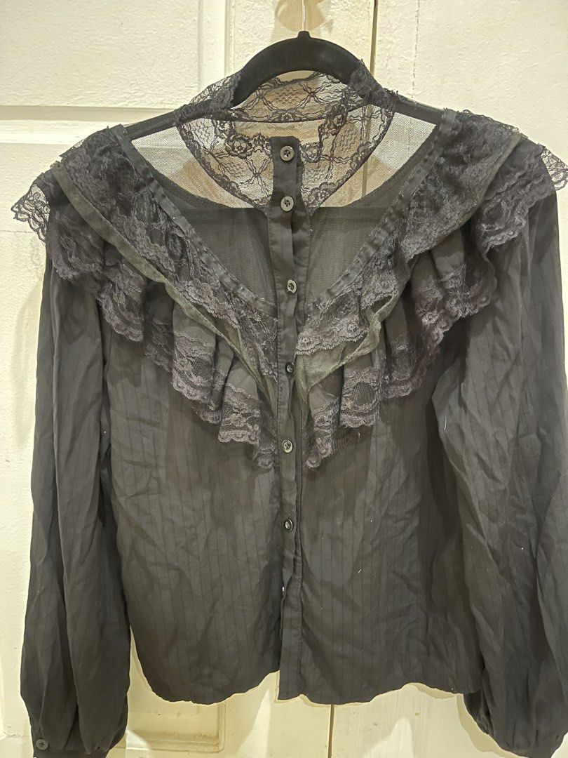 Black Lace Ruffle Button-Up Blouse (Category: Blouses) located in Davao. Submitted by giftopia (Listing ID 1449765531, Image 2). Description: Black long-sleeve blouse with sheer lace neckline and ruffled lace trim. Button-up front.