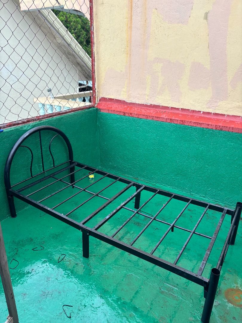 Black Metal Single Bed Frame with Headboard (Category: Bed Frames & Mattresses) located in Paranaque City. Submitted by wilsoncinc09495 (Listing ID 1449760489, Image 2). Description: - Black metal single bed frame - Features a stylish curved headboard - Includes a sturdy slatted base - Ideal for a child's bedroom or guest room - Easy to assemble - Pick up only (Valley 2, Parañaque Area) - Will reveal address if you are really interested. - Pay fi