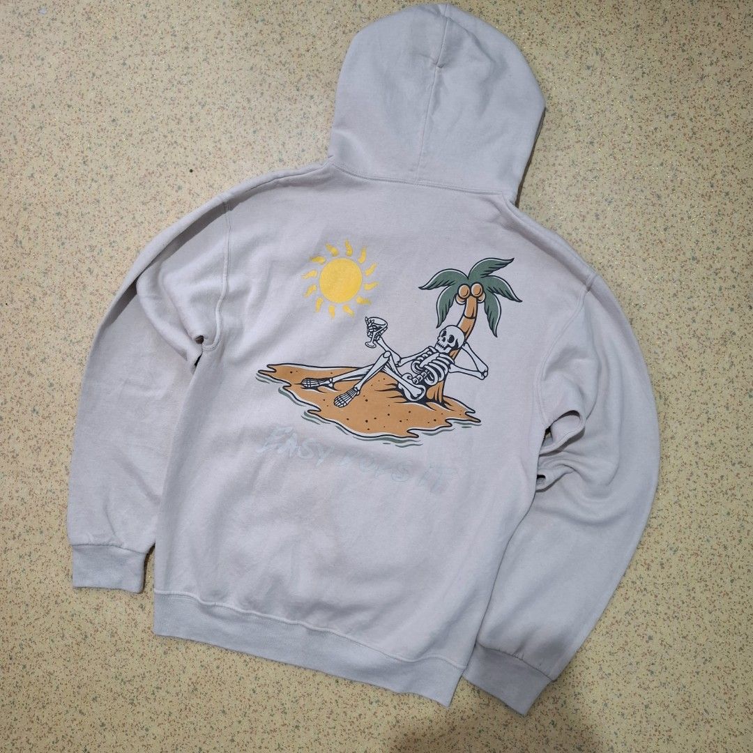 Bowery Supply Skeleton Beach Graphic Hoodie (Category: Hoodies) located in Legazpi City. Submitted by thrift_ni_mark (Listing ID 1449879668, Image 1). Description: - Cool graphic hoodie from Bowery Supply - Features a unique skeleton chilling on a beach graphic - 'Easy Does It' text on the front - Ideal for casual and laid-back outfits - Made in Honduras.