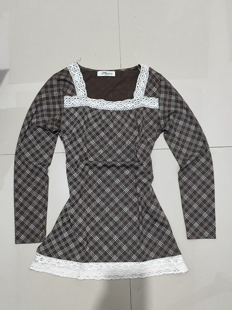 Brown long sleeve with (Category: Longsleeves) located in Dasmarinas. Submitted by cronaur (Listing ID 1449772714, Image 1). Description: - Cute brown plaid top with long sleeves, square neckline, and lace trim. - Can pair with a skirt or pants!! - Used it in 9th grade but not anymore (nakatambak lang + doesn't fit me na) - Has a yellow stain at the back part (not sure if kayang matanggal TvT) - Color may vary due to lighting Chat me here or on m