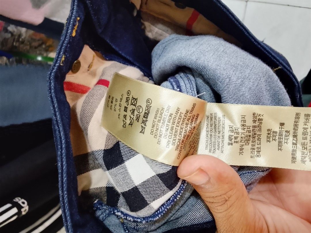 Burberry Dark Wash Flare Jeans (Category: Jeans) located in Manila. Submitted by joseph_thrift (Listing ID 1449785246, Image 3). Description: - Burberry dark wash flare jeans - Classic design with signature plaid lining - Made in China - Cotton blend with spandex for stretch - A great addition to your wardrobe.