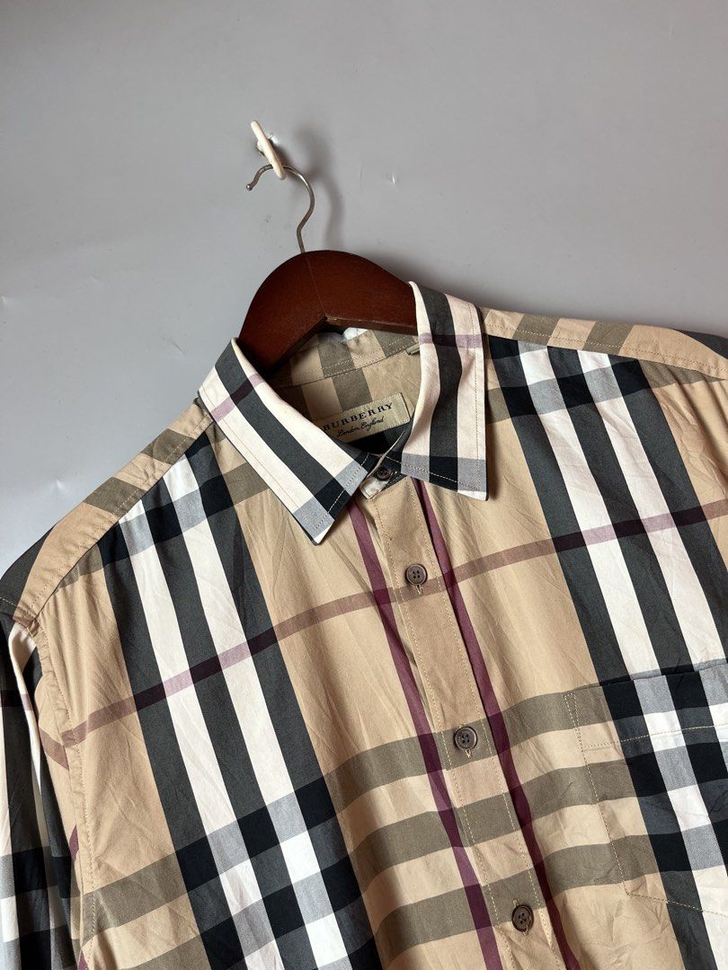 Burberry nova plaid longsleeve button up shirt (Category: Activewear) located in Quezon City. Submitted by theideal (Listing ID 1449913143, Image 2). Description: Read first before buy Legit/Authentic Burberry plaid nova checked button up longsleeve shirt Size large mens W-21 inches L- 29 inches Still in good and presentable condition No major flaws Minor sign of use only See picture details posted.