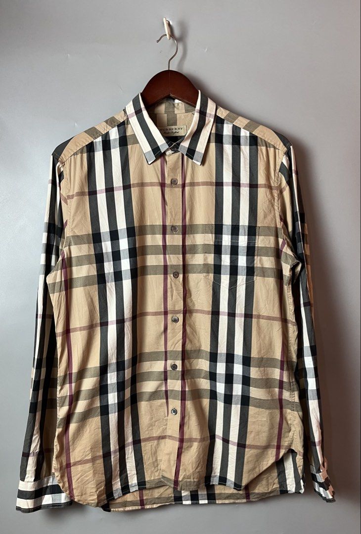 Burberry nova plaid longsleeve button up shirt (Category: Activewear) located in Quezon City. Submitted by theideal (Listing ID 1449913143, Image 1). Description: Read first before buy Legit/Authentic Burberry plaid nova checked button up longsleeve shirt Size large mens W-21 inches L- 29 inches Still in good and presentable condition No major flaws Minor sign of use only See picture details posted.