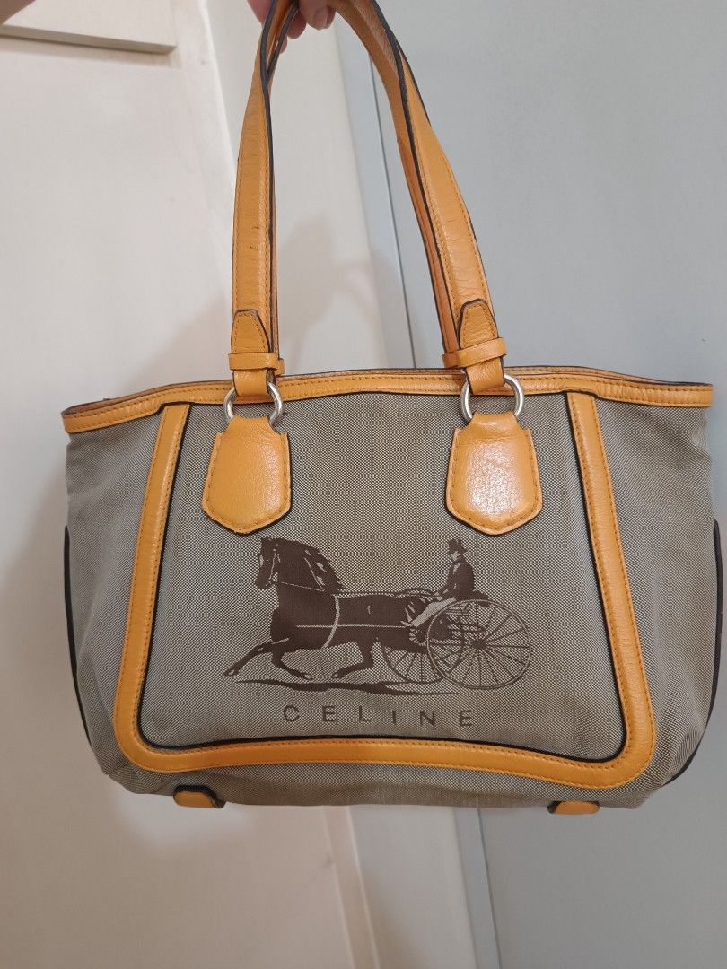 RUSH SALE Celine canvas carriage bag (Category: Luxury Bags & Wallets) located in Paranaque City. Submitted by earlylux (Listing ID 1449780405, Image 2). Description: FIRST PHOTO FOR REFERENCE ONLY Needs cleaning Please inspect photos for signs of usage/flaw No inclusions! Normal signs of usage please manage your expectations you're buying a secondhand bag. Self authentication is advised Pm for more details No return, no refund, no exchange, no c