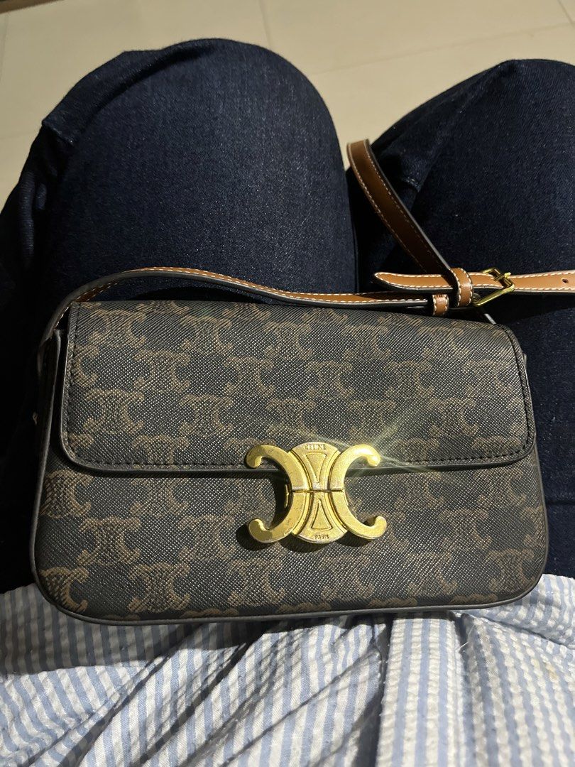 Celine Triomphe Canvas Bag (Category: Luxury Bags & Wallets) located in Meycauayan. Submitted by dresswiththefurr (Listing ID 1449936325, Image 1). Description: - Classic Celine Triomphe bag - Brown and tan monogram canvas - Gold hardware with iconic Triomphe clasp - Adjustable leather strap - Spacious tan leather interior - Versatile for daily use or special occasions.