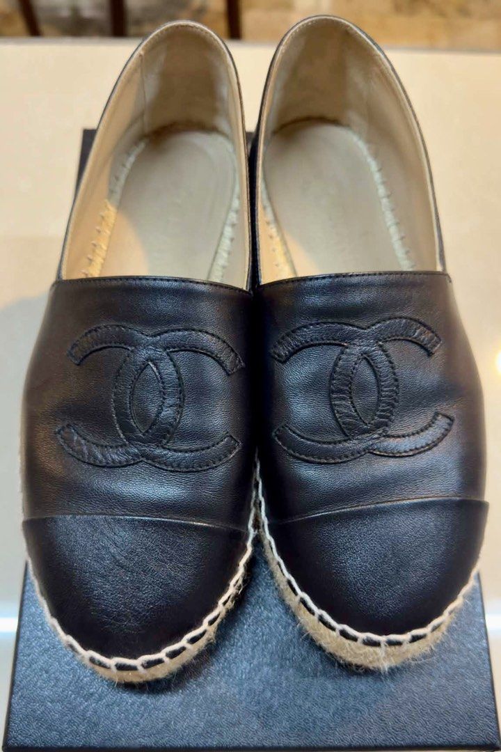 Chanel Classic Black Leather Espadrilles US7 (Category: Flats & Sandals) located in Las Pinas. Submitted by digitalpimp (Listing ID 1449945272, Image 1). Description: - Lightly used classic Chanel espadrilles for only ₱45,000. - 100% AUTHENTIC GUARANTEED. - Size EU37 / US7 - Made in Spain - Black leather with iconic CC logo. - Jute sole detail - Leather, insoles, outsoles, and all other parts are in excellent condition. - Versatile for casual or 
