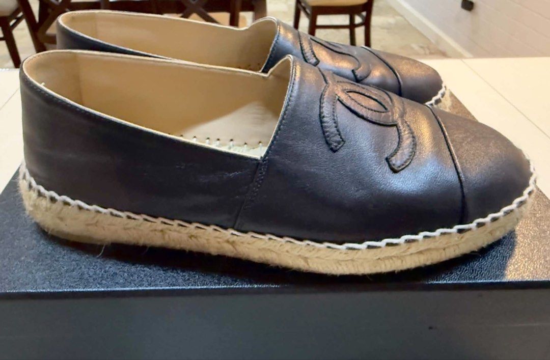 Chanel Classic Black Leather Espadrilles US7 (Category: Flats & Sandals) located in Las Pinas. Submitted by digitalpimp (Listing ID 1449945272, Image 2). Description: - Lightly used classic Chanel espadrilles for only ₱45,000. - 100% AUTHENTIC GUARANTEED. - Size EU37 / US7 - Made in Spain - Black leather with iconic CC logo. - Jute sole detail - Leather, insoles, outsoles, and all other parts are in excellent condition. - Versatile for casual or 