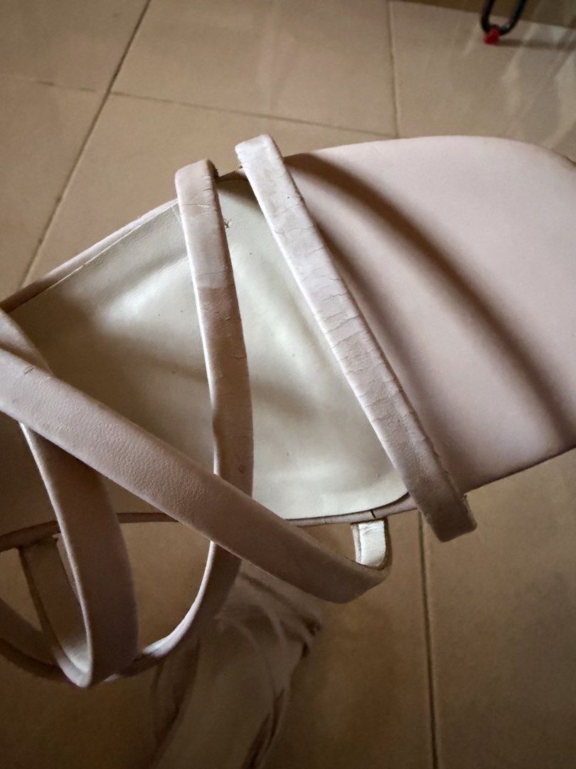 Charles and Keith Sandals Strappy Design 38 (Category: Flats & Sandals) located in Quezon City. Submitted by eleventwelveph (Listing ID 1449769801, Image 2). Description: - Light beige flat sandals - Minimalist strappy design - Square toe shape - Comfortable for everyday wear - Easy slip-on style.