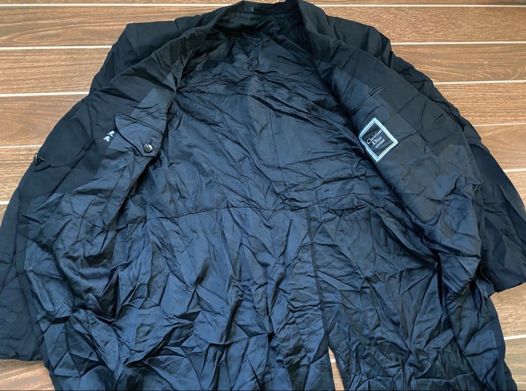 Christian Dior Black Tailcoat Tuxedo Jacket (Category: Coats, Jackets and Outerwear) located in Cebu City. Submitted by thriftpherskzai (Listing ID 1449793491, Image 3). Description: - Classic black tailcoat tuxedo jacket - Single button closure at the front - Two decorative buttons on the back - Smooth silk lining for comfort - Comes with a matching pocket square - Ideal for formal events, weddings, or costume parties CHRISTIAN DIOR TAIL COAT LO