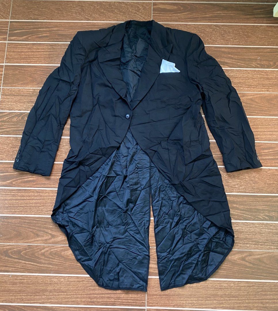 Christian Dior Black Tailcoat Tuxedo Jacket (Category: Coats, Jackets and Outerwear) located in Cebu City. Submitted by thriftpherskzai (Listing ID 1449793491, Image 1). Description: - Classic black tailcoat tuxedo jacket - Single button closure at the front - Two decorative buttons on the back - Smooth silk lining for comfort - Comes with a matching pocket square - Ideal for formal events, weddings, or costume parties CHRISTIAN DIOR TAIL COAT LO