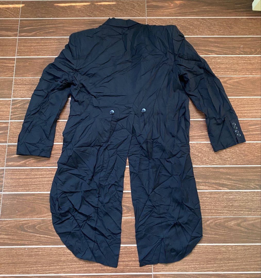 Christian Dior Black Tailcoat Tuxedo Jacket (Category: Coats, Jackets and Outerwear) located in Cebu City. Submitted by thriftpherskzai (Listing ID 1449793491, Image 2). Description: - Classic black tailcoat tuxedo jacket - Single button closure at the front - Two decorative buttons on the back - Smooth silk lining for comfort - Comes with a matching pocket square - Ideal for formal events, weddings, or costume parties CHRISTIAN DIOR TAIL COAT LO