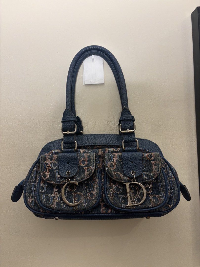 Christian Dior Monogram Denim Shoulder Canvas Bag (Category: Luxury Bags & Wallets) located in Manila. Submitted by elevist (Listing ID 1449949006, Image 3). Description: - Authentic Dior monogram denim shoulder bag - Features two front pockets with CD and D charms - Genuine leather trim and handles - Secure zipper closure - A timeless addition to your collection - Ideal for everyday wear.