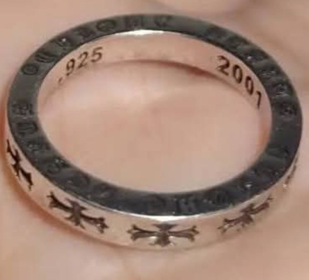 Chrome Hearts Style Silver Ring .925 2001 (Category: Rings) located in Manila. Submitted by thrifty_cool (Listing ID 1449878174, Image 1). Description: - Genuine.925 Sterling Silver ring - Features intricate cross details all around the band - Stamped with.925 and the year 2001 - Classic band style, perfect for stacking or wearing solo -Size 8.
