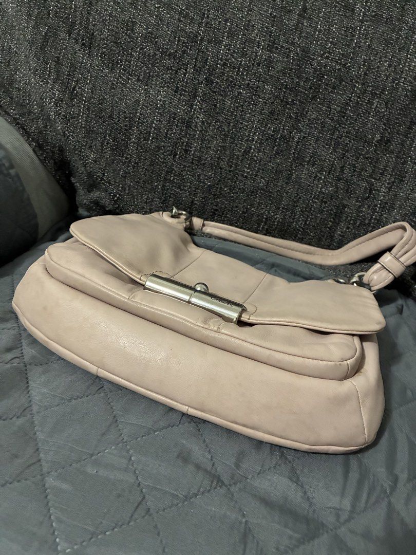 Coach Leather Shoulder Bag (Category: Luxury Bags & Wallets) located in Kabankalan. Submitted by mad_zillaaa (Listing ID 1449886918, Image 3). Description: - Made of soft leather - Silver hardware with front closure - Interior: zippered pocket and main compartment - Ideal for everyday use - FLAWS: medyo madumi.
