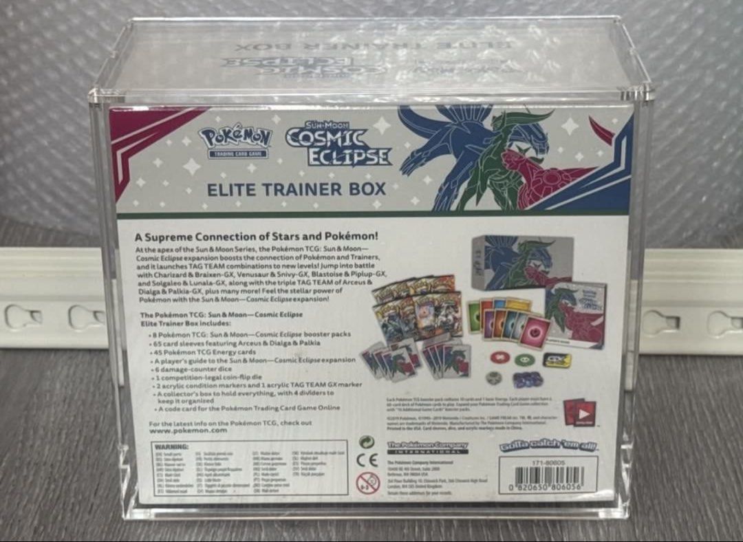 Cosmic Eclipse ETB (Category: Card Boxes & Cases) located in Singapore. Submitted by printsandpatterns (Listing ID 1449796844, Image 2). Description: MINT Cosmic Eclipse Current bid $3200 Will release to any higher offers PM me 🙏🏼 Brand new, Mint, No tears/ holes/ defects.