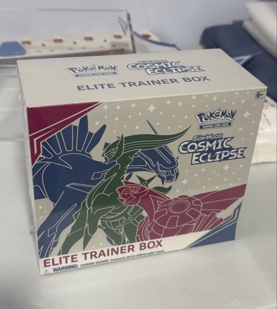 Cosmic Eclipse ETB (Category: Card Boxes & Cases) located in Singapore. Submitted by printsandpatterns (Listing ID 1449796844, Image 3). Description: MINT Cosmic Eclipse Current bid $3200 Will release to any higher offers PM me 🙏🏼 Brand new, Mint, No tears/ holes/ defects.