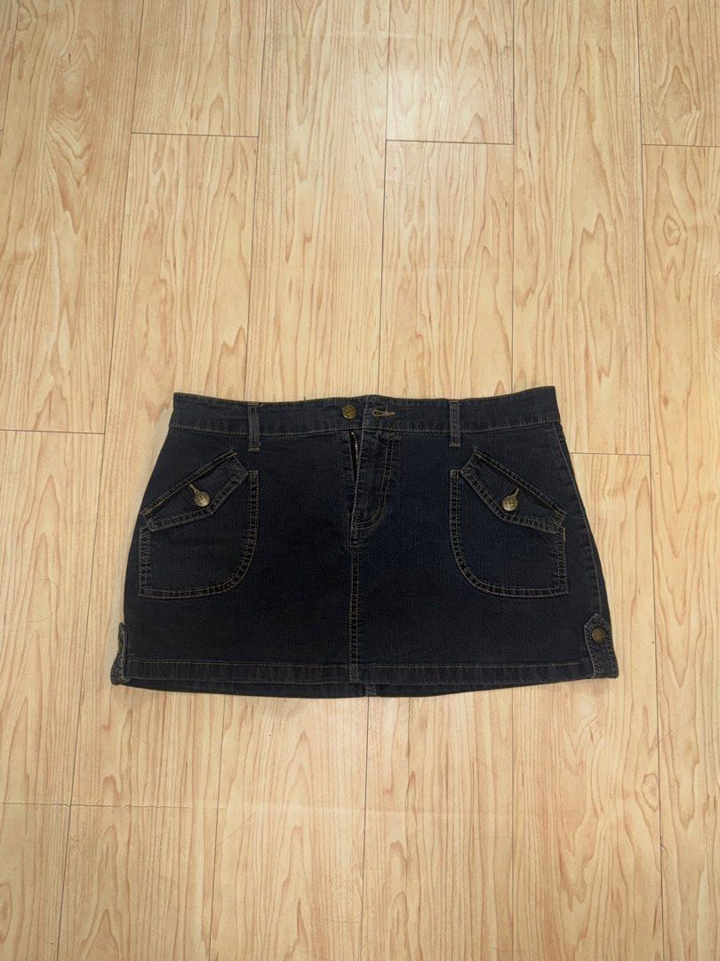 Dark Wash Denim Mini Skirt with Pockets (Category: Skirts) located in Quezon City. Submitted by irishgdl (Listing ID 1449872901, Image 1). Description: - Cute dark wash denim mini skirt - Features front pockets with button details - Hem has button detail on each side - Ideal for casual wear - Easy to pair with various tops.