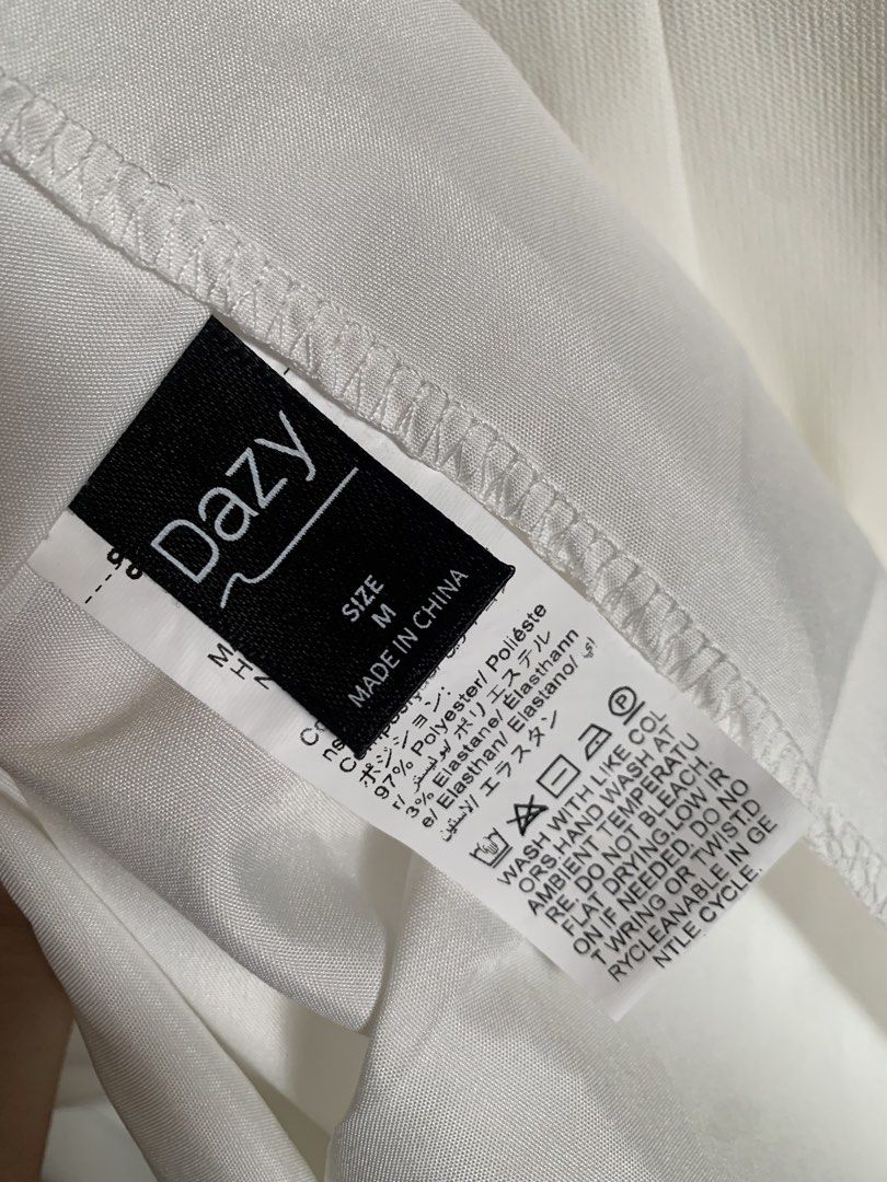 Dazy White Midi Dress Size M (Category: Dresses) located in San Miguel. Submitted by cloweng08 (Listing ID 1449851508, Image 2). Description: - White midi dress from Dazy - Short sleeves - Round neckline - Simple and classic design - Versatile for events or everyday wear - Material: Polyester and Elastane - Size: Medium (M).