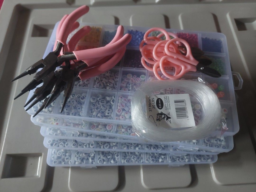 DIY BEAD SET & PLIERS - letter seed circle tiny beads (Category: Craft Supplies & Tools) located in Taguig. Submitted by wenxuanhao (Listing ID 1449950953, Image 2). Description: [ for sale ] — 5pcs diy beads set — 5pcs mini scissors — 4pcs 2in1 diy pliers — 37m nylon ♡ on hand ♡ take all for ₱500 + sf ♡ rfs: decluttering 📍 Metro Manila 💳 Gcash / Maya / GoTyme / MariBank.