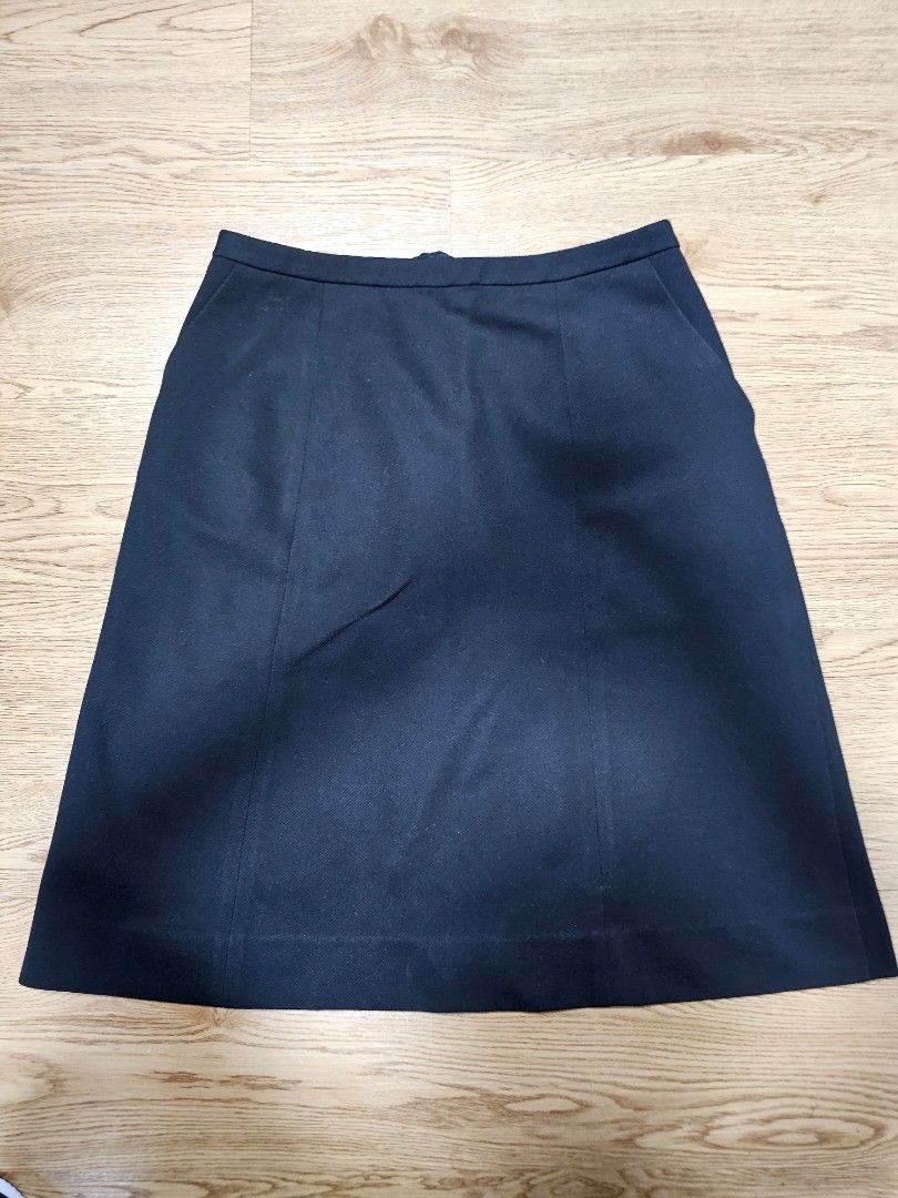 Enjoy Black A-line Midi Skirt (Category: Skirts) located in Manila. Submitted by tunabreads (Listing ID 1449857623, Image 2). Description: - Black midi skirt from Enjoy, A-line cut - No size on tag but can fit S-M - Zip and button closure, missing hook but can be mended or used without hook - Fabric itself has no issues DM if Interested!.