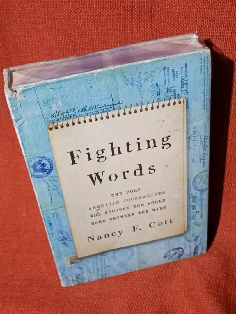 Fighting Words by Nancy F. Cott (Category: Storybooks) located in Manila. Submitted by krishna_ayanami (Listing ID 1449894474, Image 2). Description: - Book Title: Fighting Words: The Bold American Journalists Who Brought the World Home Between the Wars - Author: Nancy F. Cott - Topic: Fascinating read on American journalism history between the World Wars. - Cover Design: Unique with stamps and writing. - Binding: Spiral spine..